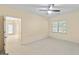 Bright bedroom with a ceiling fan and natural light at 914 Champions Way, Mcdonough, GA 30252
