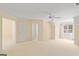 Open bedroom featuring plush carpets, fan, and great natural light at 914 Champions Way, Mcdonough, GA 30252