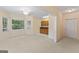 Bright living room with an open area and natural light at 914 Champions Way, Mcdonough, GA 30252