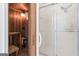 Sauna and shower with a glass door inside a bathroom at 107 Edgewater Way, Peachtree City, GA 30269