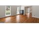 Spacious living room featuring hardwood floors, bright light, and neutral walls at 107 Edgewater Way, Peachtree City, GA 30269