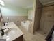 Bathroom with double sink vanity, soaking tub, and separate shower at 424 Ivey Edwards Ln, Mcdonough, GA 30253