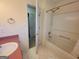 Bathroom featuring a toilet, bathtub/shower combo, and a sink at 424 Ivey Edwards Ln, Mcdonough, GA 30253