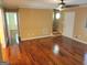 Inviting living room showcases beautiful hardwood floors and natural light at 424 Ivey Edwards Ln, Mcdonough, GA 30253