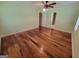 Light-filled main bedroom featuring gleaming wood floors and ensuite access at 424 Ivey Edwards Ln, Mcdonough, GA 30253