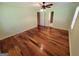 Light-filled main bedroom featuring gleaming wood floors and ensuite access at 424 Ivey Edwards Ln, Mcdonough, GA 30253