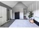 Spacious bedroom featuring gray walls, vaulted ceiling, and neutral-toned bedding at 184 Fashion Xing, Mcdonough, GA 30252