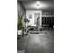 Home gym featuring exercise bike, weight bench, free weights, and rubber flooring at 184 Fashion Xing, Mcdonough, GA 30252