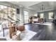 Tranquil main bedroom with large windows, wood flooring, and stylish decor at 184 Fashion Xing, Mcdonough, GA 30252