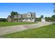 Charming home with a long drive and a detached garage, complemented by a spacious, well-manicured lawn at 603 Rossie Court, Mcdonough, GA 30252