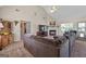 Comfortable living room with fireplace, vaulted ceiling, and ample seating at 603 Rossie Court, Mcdonough, GA 30252