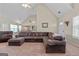 Spacious living room with vaulted ceiling, neutral walls, and access to the dining area at 603 Rossie Court, Mcdonough, GA 30252