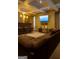 Finished basement featuring a wet bar, comfortable seating, and entertainment area at 45 Oak Wood Lane, Covington, GA 30016
