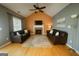 Inviting living room with vaulted ceilings, fireplace, and ample natural light at 45 Oak Wood Lane, Covington, GA 30016