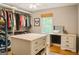 A spacious walk-in closet offers ample storage and organization solutions at 45 Oak Wood Lane, Covington, GA 30016