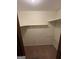 Walk-in closet featuring a rod for hanging and additional high shelving at 5277 Scofield Rd, South Fulton, GA 30349