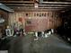 Garage interior view with a visible American flag, a work area and concrete floor at 5277 Scofield Rd, South Fulton, GA 30349