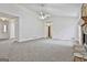 Expansive living room featuring neutral carpet and ample open space for flexible furniture arrangements at 100 Walnut Ct, Stockbridge, GA 30281
