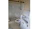 Bathroom with a shower-tub combo, white tile, and modern vanity at 3211 Rockview Dr, Lithonia, GA 30038