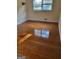 Bedroom featuring gleaming hardwood floors and a sun-filled window at 3211 Rockview Dr, Lithonia, GA 30038