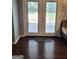 Entryway featuring double doors and dark wood flooring at 3211 Rockview Dr, Lithonia, GA 30038