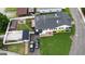 Aerial view of a home with a shed, deck, and well-maintained yard at 1 Hemlock, Porterdale, GA 30014