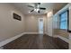 Bedroom includes a ceiling fan, closet, and window for ample natural light at 1 Hemlock, Porterdale, GA 30014