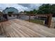 Open wooden deck with black railings, offering a relaxing outdoor space at 1 Hemlock, Porterdale, GA 30014