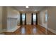 Bright living room showcasing hardwood floors and a decorative fireplace at 1 Hemlock, Porterdale, GA 30014