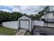 Shed with roll-up door and ramp, offering convenient storage solutions at 1 Hemlock, Porterdale, GA 30014