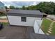 Outdoor shed with black roof for extra storage space at 1 Hemlock, Porterdale, GA 30014
