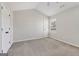 Bedroom with carpet flooring, window, closet, and a ceiling fan for comfort at 162 Watercress Ct, Stockbridge, GA 30281