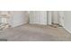 Expansive living room offers a view of the dining room and plenty of space for entertaining at 162 Watercress Ct, Stockbridge, GA 30281