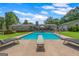 Backyard with a diving pool, patio and expansive yard perfect for entertaining or relaxing at 396 Ebenezer Rd, Fayetteville, GA 30215