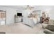 Airy bedroom featuring carpet, decorative ceiling fan, and a calming color palette at 396 Ebenezer Rd, Fayetteville, GA 30215