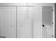 Large, white closet doors with classic hardware provide ample storage space at 396 Ebenezer Rd, Fayetteville, GA 30215