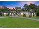 Charming single-story home with well-manicured lawn, stone walkway, and inviting front entrance at 396 Ebenezer Rd, Fayetteville, GA 30215