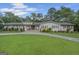 Charming single-story home with well-manicured lawn, stone walkway, and inviting front entrance at 396 Ebenezer Rd, Fayetteville, GA 30215
