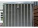 Close-up of a well-maintained Ruud HVAC unit, showcasing its quality and efficient cooling system at 396 Ebenezer Rd, Fayetteville, GA 30215