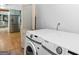 Clean laundry room featuring newer model washer and dryer at 396 Ebenezer Rd, Fayetteville, GA 30215