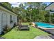 Relaxing lounge chairs beside the pool, creating an inviting space for poolside relaxation at 396 Ebenezer Rd, Fayetteville, GA 30215