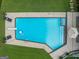 Aerial view of a sparkling in-ground pool with chaise lounges and a diving board at 396 Ebenezer Rd, Fayetteville, GA 30215
