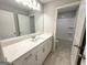 Bathroom with double doors, large mirror, and tub/shower combo at 248 Webster Lake Dr, Temple, GA 30179