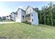 Desirable neighborhood featuring well-kept homes, attached garages, and vibrant green lawns, creating a welcoming community atmosphere at 248 Webster Lake Dr, Temple, GA 30179
