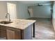 Modern kitchen island with granite countertops, stainless steel appliances, and open floor plan at 248 Webster Lake Dr, Temple, GA 30179
