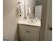 Well-lit bathroom with vanity, mirror, and white towels at 4790 Hwy 101 N, Rockmart, GA 30153