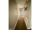 Neutral-toned hallway with updated flooring and recessed lighting at 4790 Hwy 101 N, Rockmart, GA 30153