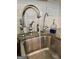 Close-up of a modern stainless steel kitchen sink with granite countertops at 4790 Hwy 101 N, Rockmart, GA 30153