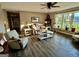 Inviting living area with wood flooring, a large window, and comfortable seating at 4790 Hwy 101 N, Rockmart, GA 30153