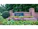 Welcoming Chestnut Hill brick sign with beautiful flowers at 710 Larkspur, Acworth, GA 30102